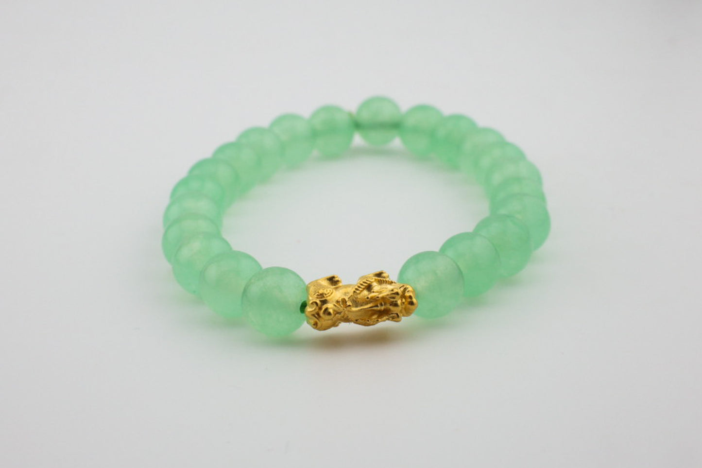 8mm Light Green Dyed Jade with Dragon Charm Bracelet