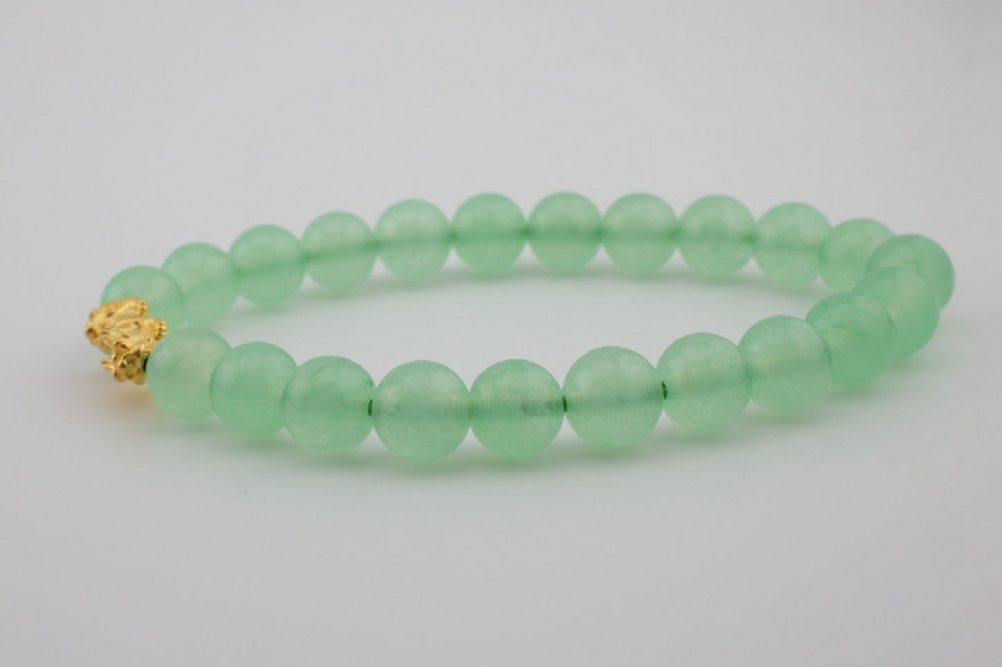 8mm Light Green Dyed Jade with Dragon Charm Bracelet